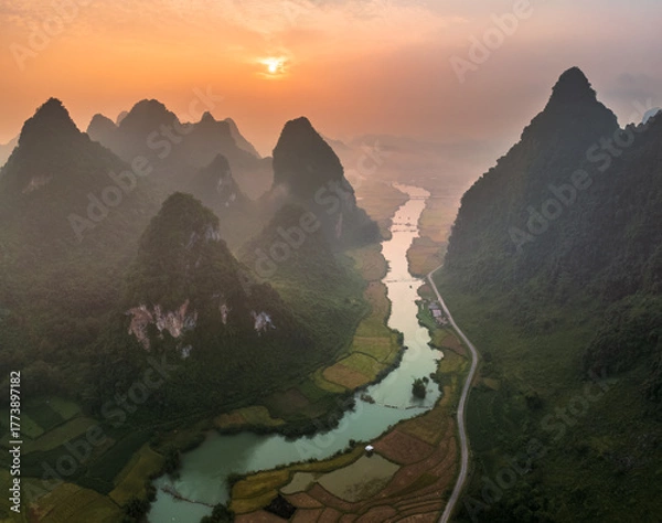 Fototapeta Aerial drone view sunrise over rice terrace paddle field around the river at Phong Nam, Trung Khanh, Cao Bang, Vietnam