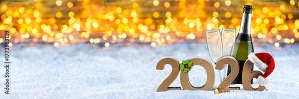 Fototapeta Festive scene showcases a champagne bottle and glasses next to sparkling lights and the year 2026, capturing the joyful spirit of a new year's celebration