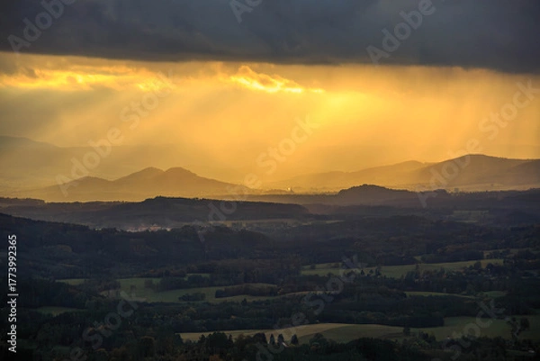 Fototapeta Lusatian mountains in dark autumn with sunrays
