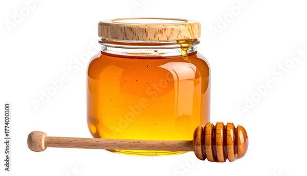 Obraz A clear glass jar of golden honey, a wooden dipper lies beside it, all on black
