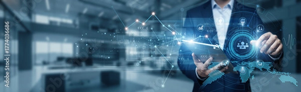 Fototapeta Businessman using tab analyzing growth graph data on HR, talent management, employee performance tracking, recruitment analytics, workforce planning, human capital optimization