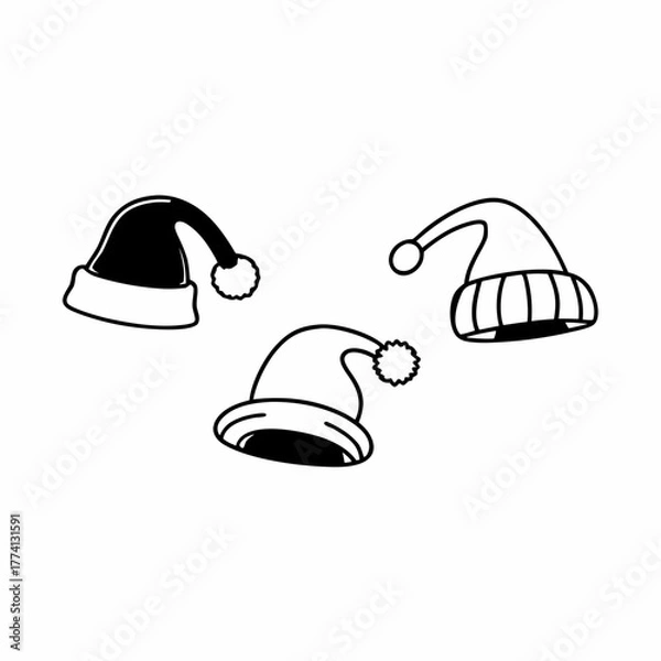 Obraz Three santa hats are arranged on a, each with a unique design and style, perfect for christmas decorations and holidaythemed projects