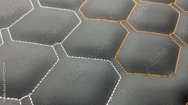 Fototapeta Beautiful thread stitching on the black leather. purpose for background