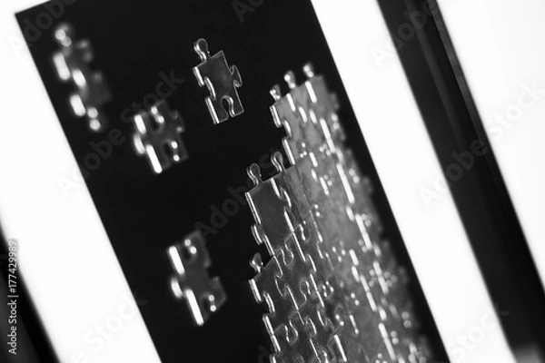 Fototapeta Srebrne puzzle na obrazie na płótnie. 