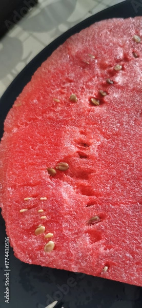 Obraz slice cut from a seedless watermelon