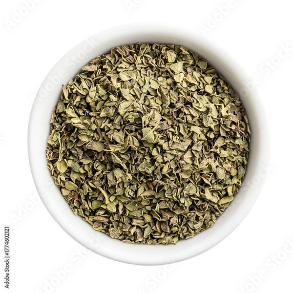 Fototapeta Dried chopped basil in white ceramic bowl Isolated transparent on white background