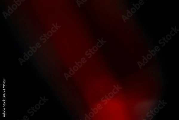 Obraz Abstract motion blur of bright red and orange city street lights creating a dark, colorful bokeh fire effect