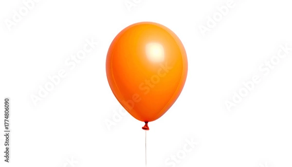 Fototapeta A solitary, vibrant orange balloon floats in the center against a stark black background