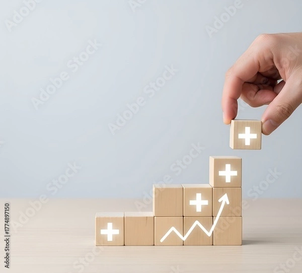 Fototapeta Growth and progress concept with wooden blocks stacked upward and glowing plus signs. Business improvement, success, positive mindset, teamwork, motivation, development, and financial achievement 