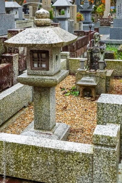 Fototapeta It is considered the largest cemetery in Japan, with more than two hundred thousand graves and memorial monuments. It is located on the sacred Mt. Koya and is immersed in a forest of tall conifers.