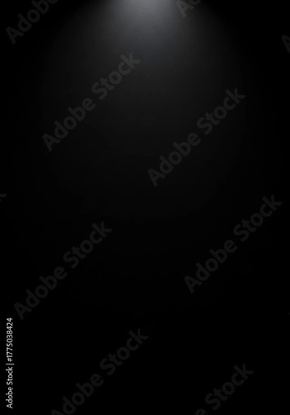 Fototapeta Sleek black surface with subtle texture and moody lighting for a dramatic and modern backdrop or background effect