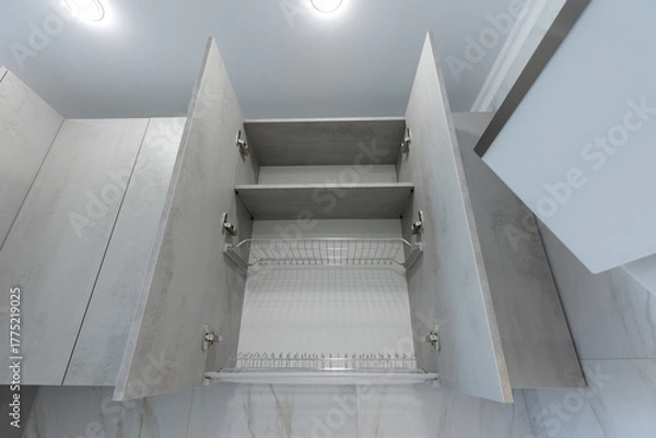 Obraz Open cabinet with Dish drainer.