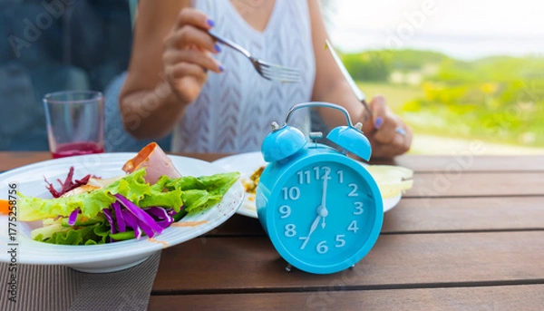 Fototapeta Healthy Meal with Time Schedule by the Intermittent Fasting Clock