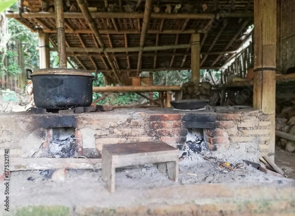 Fototapeta Traditional Balinese house architecture, with wooden and bamboos materials