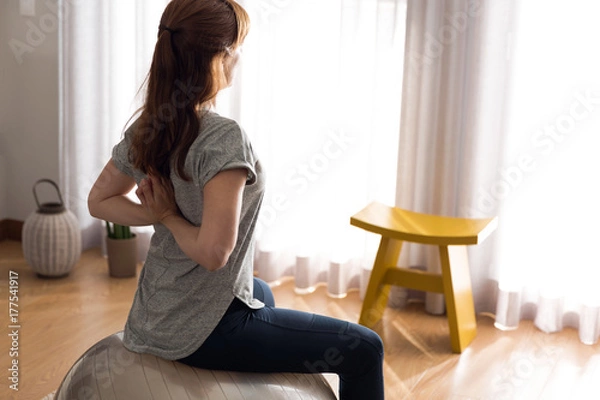 Fototapeta Doing exercise at home
