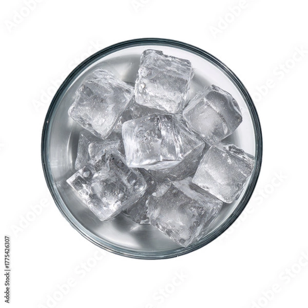 Fototapeta Overhead view of a clear glass containing numerous translucent, crystalline ice cubes