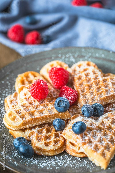 Obraz Homemade waffles with powdered sugar and berries