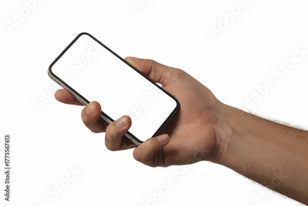 Fototapeta A Close-Up Photograph of a Light-Skinned Hand Holding a Smartphone with a Blank Isolated White Screen on a White Background