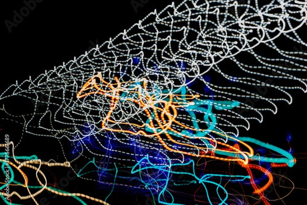 Fototapeta Abstract background, colored lines on black background	