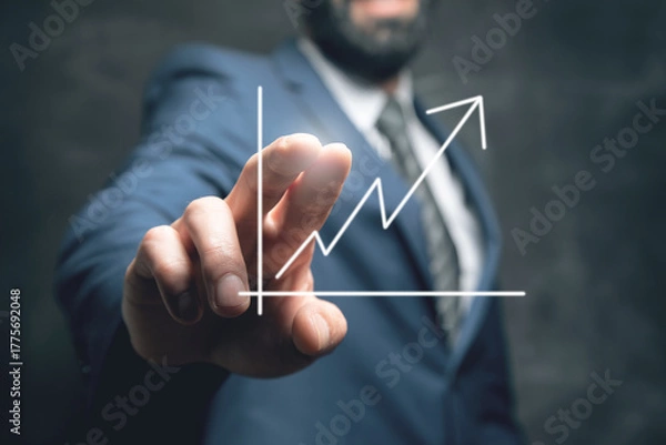 Obraz hand holding a chart with an arrow pointing up