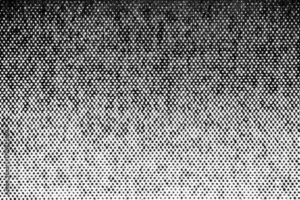 Fototapeta Vertical halftone gradient with dense black dots transitioning smoothly to light, set on a transparent background for bold graphic contrast.