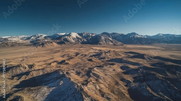 Obraz Breathtaking aerial view of rocky mountain landscape high altitude nature photography clear skies expansive terrain