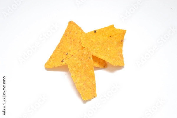 Obraz Three brightly colored, cheese-flavored tortilla chips isolated on a clean white background. Perfect close-up for advertising, packaging, snack food.