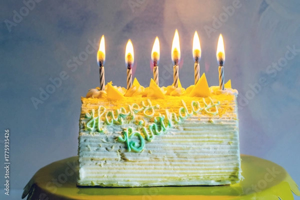 Obraz  Lemon torte birthday cake with candles si ready to be enjoyed at a party