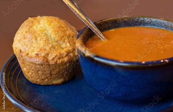Obraz Warm Corn bread muffin with a creamy bowl of  tomato soup