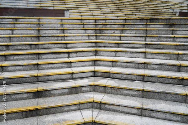 Fototapeta Empty concrete steps.  Concrete staircase, ascent and descent. Building concrete staircase in the city.