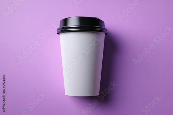 Fototapeta White paper coffee cup with black lid on a purple background