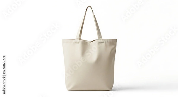 Fototapeta Blank cream canvas tote bag mockup. Ideal for custom branding, eco-friendly shopping, versatile daily accessory. Isolated on white, showcasing sustainable reusable fabric design