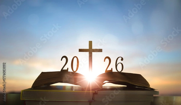 Fototapeta Happy new year 2026 and christian cross on the old book.