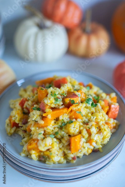 Fototapeta Pumpkin risotto prepared with pumpkin puree 