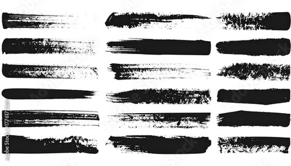 Fototapeta Collection of rough black brush strokes isolated on white, varying in width, texture, and density