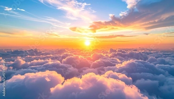 Fototapeta Ethereal sunset over a sea of clouds with golden light bathing the fluffy forms, creating a heavenly vista