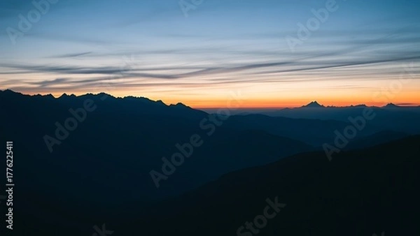 Obraz Mountain landscape bathed in twilight hues of deep blue and fading sunset colors.