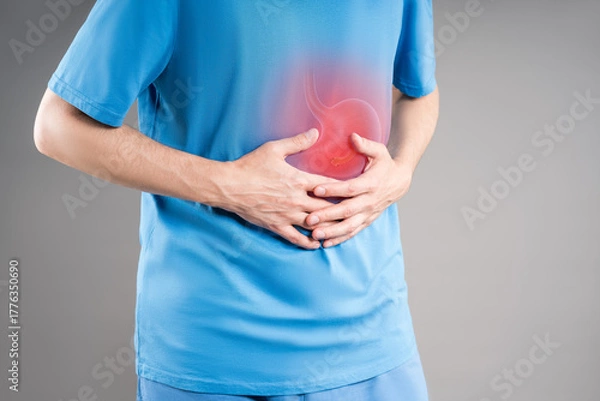 Obraz Stomach ulcer, bloating, man with abdominal pain, symptoms of gastritis, diseases of the digestive system