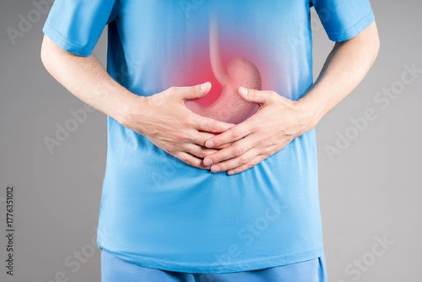 Obraz Stomach ulcer, man with abdominal pain, symptoms of gastritis, diseases of the digestive system, gray background
