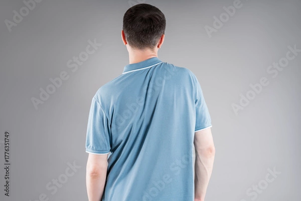 Obraz Incorrect posture, man with severe spinal curvature on gray background, healthcare and medicine concept
