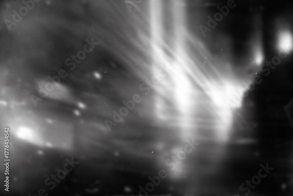 Fototapeta retro film overlay effect with scratch dust and motion blur light leaks,retro grain noisy film distressed texture light leak flare on black background,grunge film background,old film burn texture