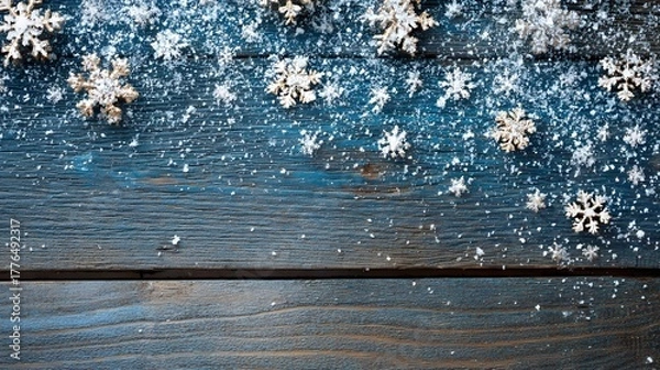 Obraz Christmas Wooden Background with Snow and Golden Snowflakes Winter Holiday Season Concept Blue Rustic Texture Top View with Empty Space for Greeting Card or Banner Design