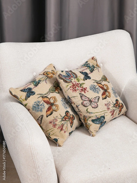 Obraz sofa cushions and bedspreads made of tapestry on a sofa or armchair, variegated fabric