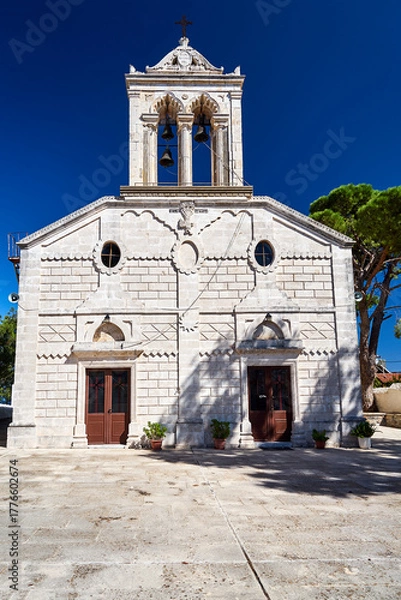 Fototapeta Orthodox chapel and stone marble tombs in a Greek cemetery in the mountains on the island of Crete