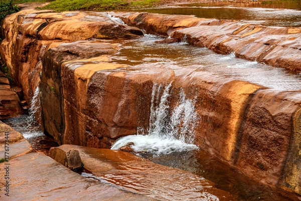 Obraz River flowing over rocks and forming small waterfalls in the state of Minas Gerais, Brazil.