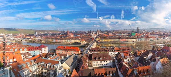 Fototapeta Wide view of Wurzburg, Germany with Old Main Bridge, churches, Main River and city rooftops under blue sky