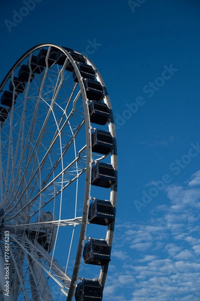 Fototapeta ferris wheel on a blue sky