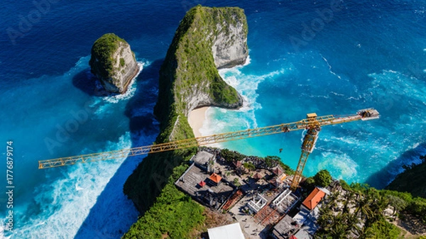 Fototapeta Aerial drone view of Kelingking Beach with construction crane on clifftop