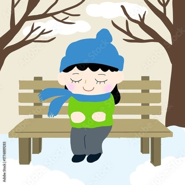 Fototapeta 公園のベンチに座りマフラーで寒さをしのぐ人