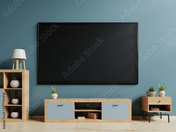 Fototapeta Smart TV on stand and wall blue background. 3d rendering